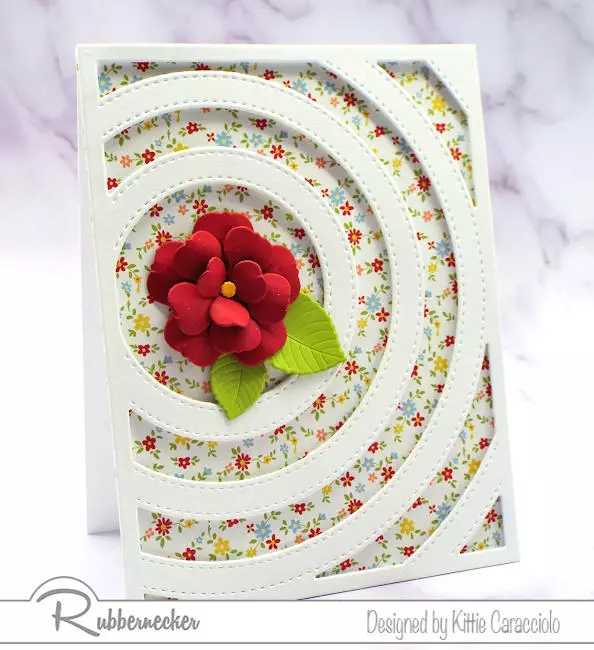 this ideas for easy to make classy cards requires only patterned paper, a die cut blossom and a cover die cut