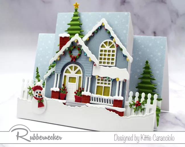 A handmade Christmas house card loaded with seasonal details all made with easy to use, brand new dies from Rubbernecker.