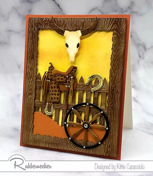 An incredibly detailed handmade western card made using textured card stock and detailed die cuts.