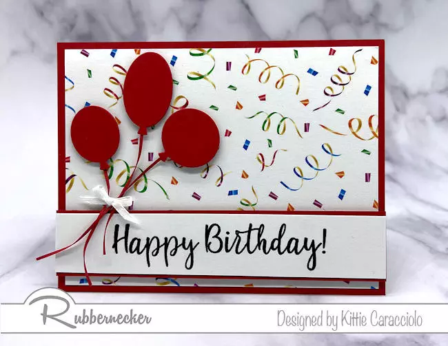 This festive easy simple birthday card handmade with just a few supplies to create the balloon embellishment and the hand stamped greeting.
