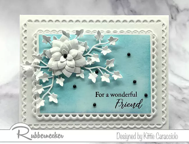 An example of beautiful monochromatic cards to make using one color of ink for the background and white on white dimensional floral details.