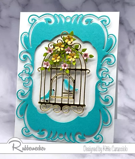 A handmade card that shows off a die cutting hack for custom frames.