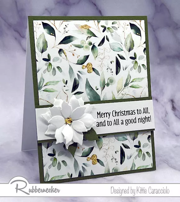 A single die cut and shaped classis white blossom set over a patterned paper background make these fast and easy poinsettia cards simple to make and glorious to receive.