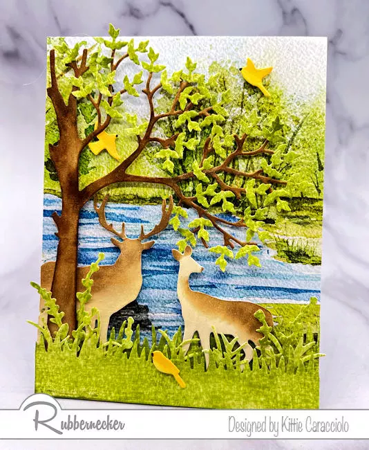 A beautiful nature scene on a handmade card with a background creating with one of the designs in Rubbernecker