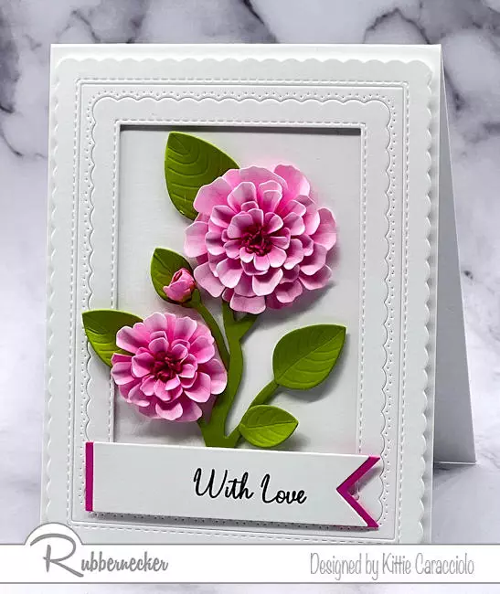 A card made by inking paper flowers die cut from white card stock and then shaped to form realist blossoms.