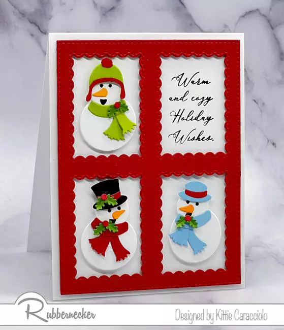 A handmade card with mini snowmen made from easy die cuts set inside windows created with  a die cut frame.