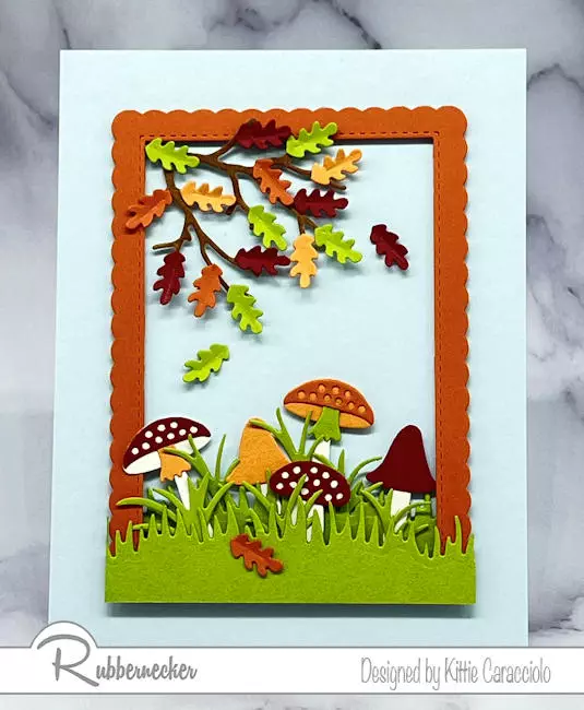 Cute little mushrooms, autumn leaves and fresh green grass combine on this design for sweet fall cards to make with die cuts.