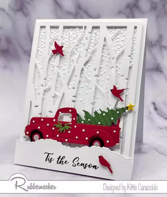 Layering all the elements with different thicknesses of dimensional adhesive give a realistic look to this wintry scene card handmade with die cuts.
