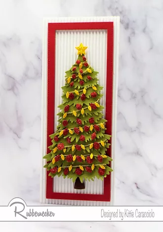 you can make this slimline Christmas tree card loaded with the layers and ornaments with easy to use dies from Rubbernecker
