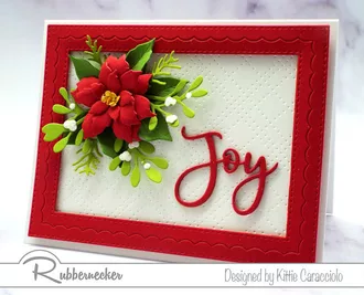 Make a poinsettia and mistletoe card using new dies from Rubbernecker for this bold red, realistic looking poinsettia flower surrounded by winter foliage.