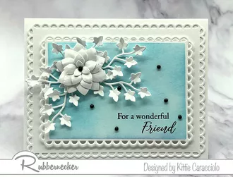 An example of beautiful monochromatic cards to make using one color of ink for the background and white on white dimensional floral details.